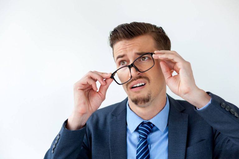 Man wearing glasses at Vasan Eye Care Hospital